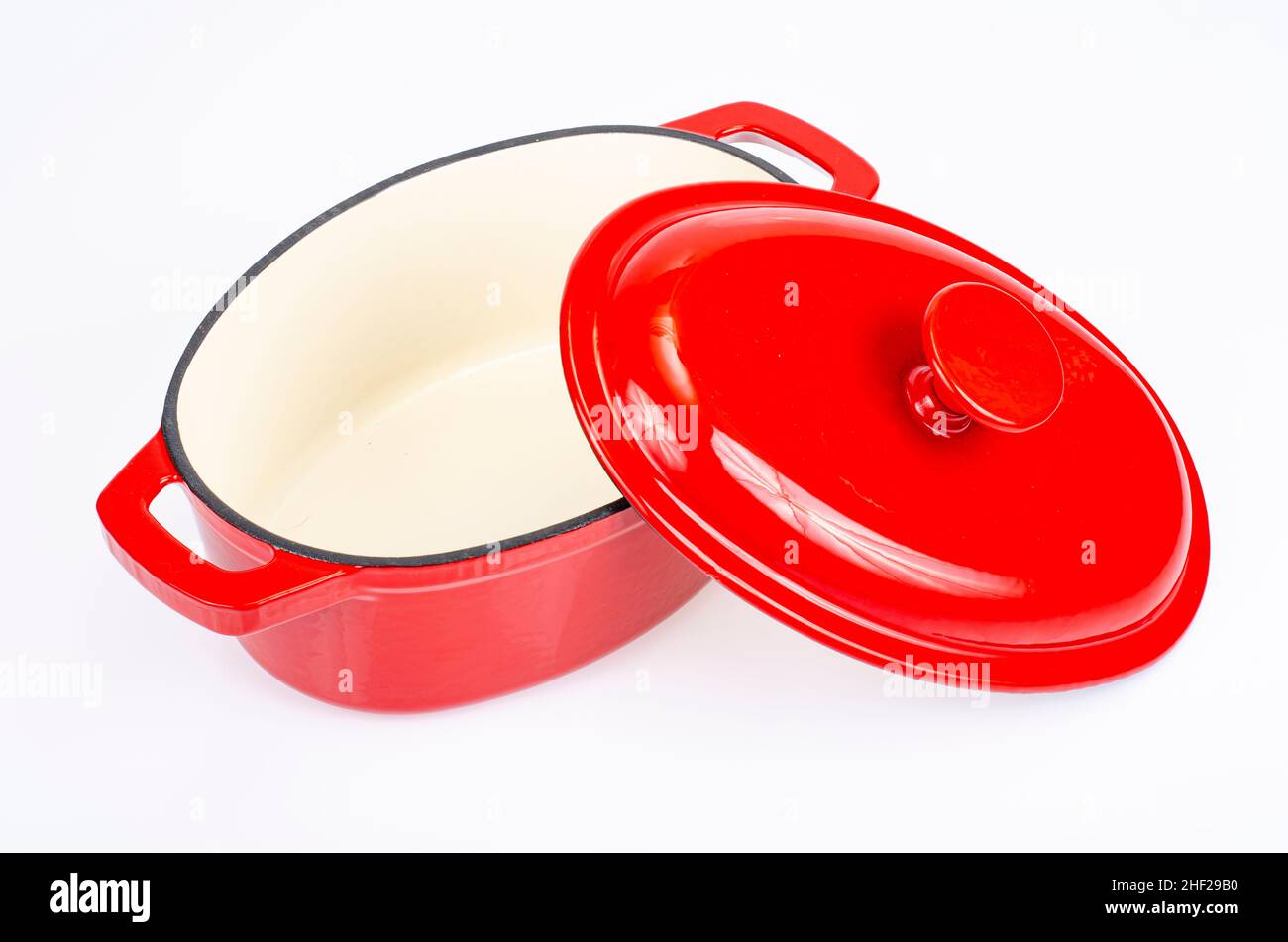 Red ceramic cast iron casserole dish. Studio Photo Stock Photo Alamy