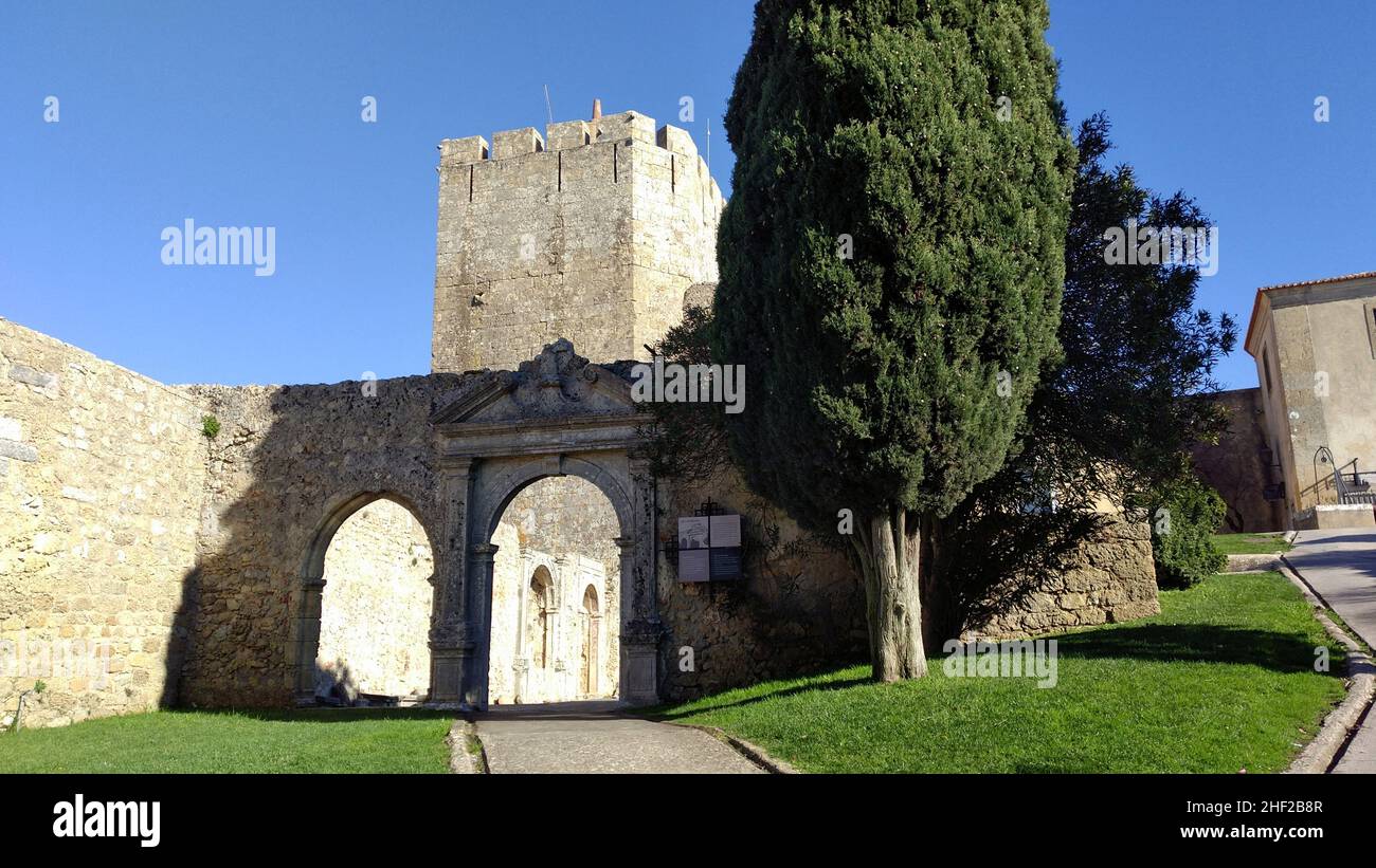 Medieval Castle of Palmela, tower at the entrance and fragment of the wall, near Setubal, Portugal Stock Photo