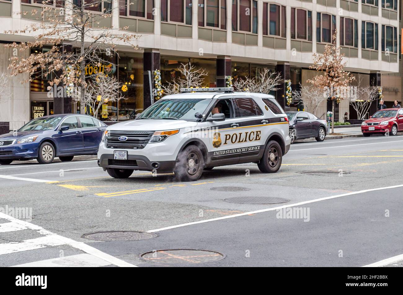 US Secret Service Vehicle. Police SUV Passing By the Avenue in Washington DC, VA, USA Stock Photo