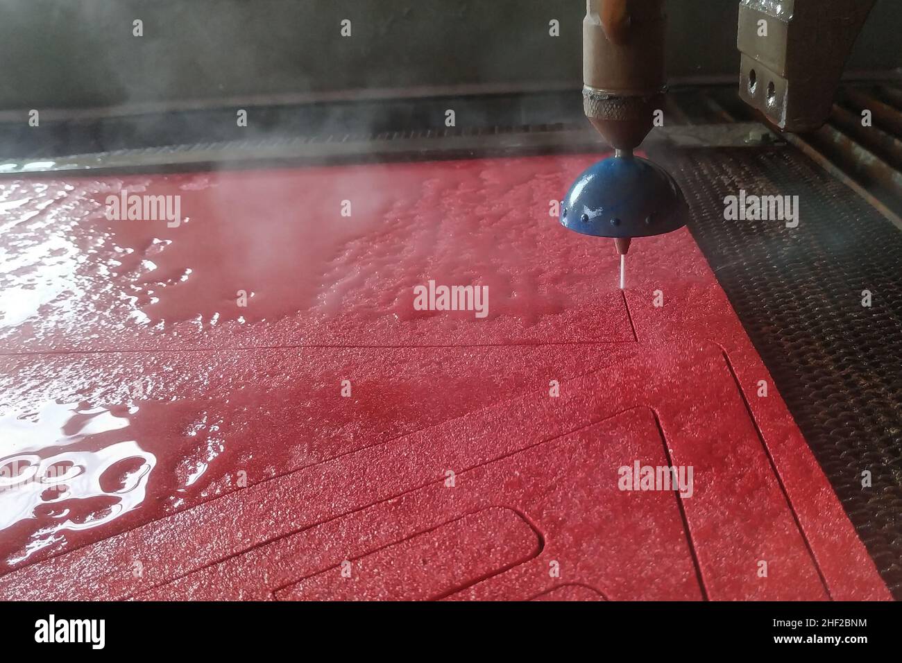 CNC water jet cutting machine is a modern industrial technology for