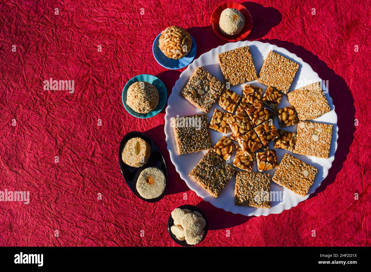 Tasty Indian sesame brittles and Peanut jaggery candy bars known as Til