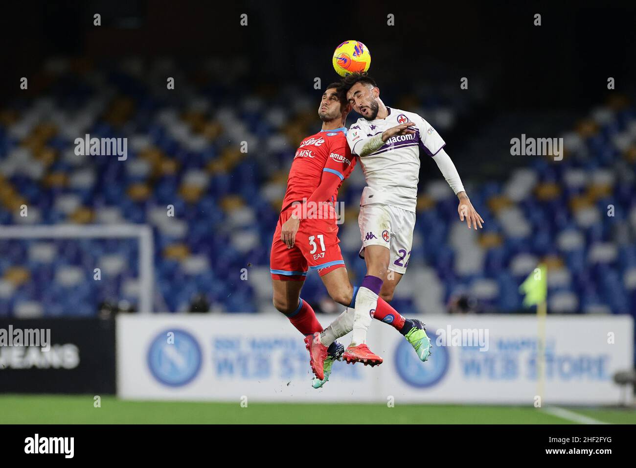 Napoli, Italy. 13th Jan, 2022. Faouzi Ghoulam of SSC Napoli and Nicolas  Gonzalez of ACF Fiorentina during the Italy cup round of 16 football match  between SSC Napoli and ACF Fiorentina at