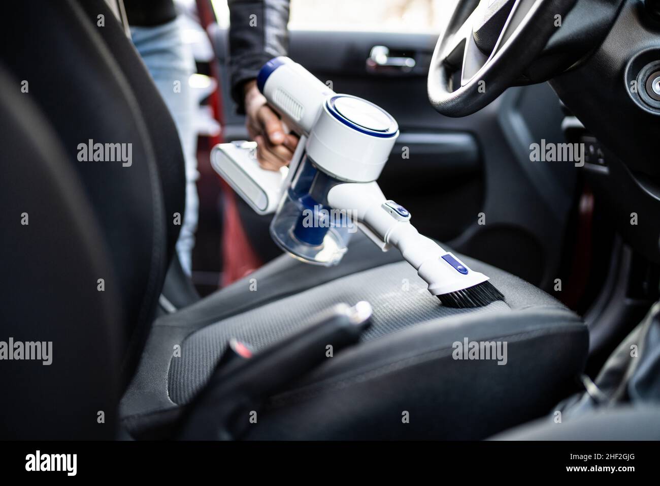 Car Seat Interior Cleaning With Portable Vacuum Cleaner Stock Photo Alamy