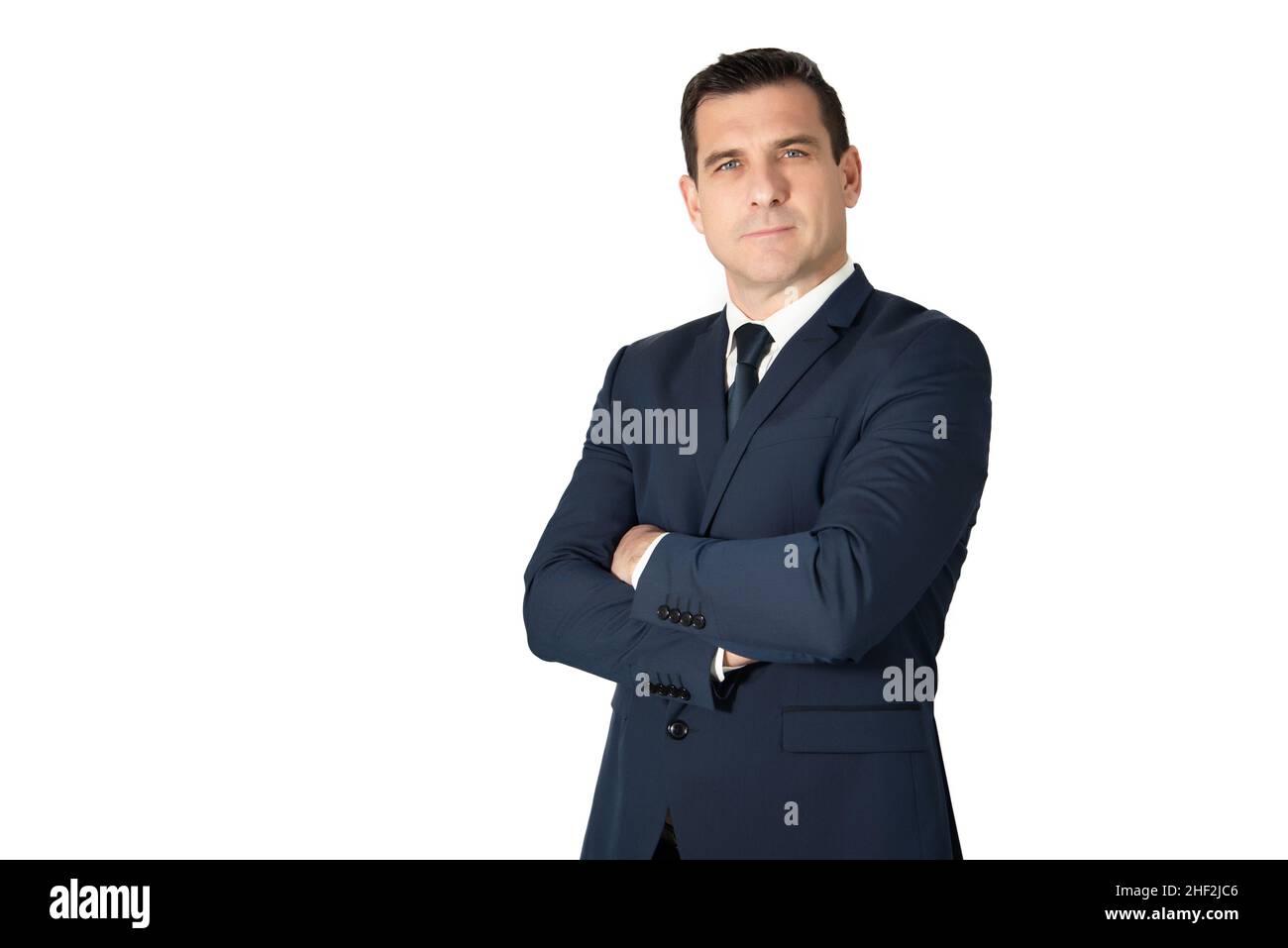 Attractive business man in business suit with crossed arms. Isolated ...