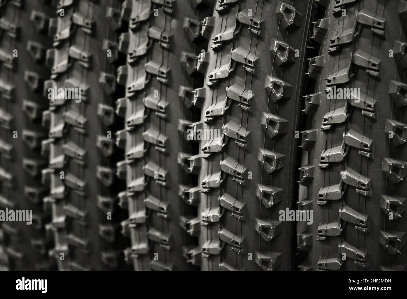 Group of new bicycle tires. Rubber tires close up. Bicycle tires with