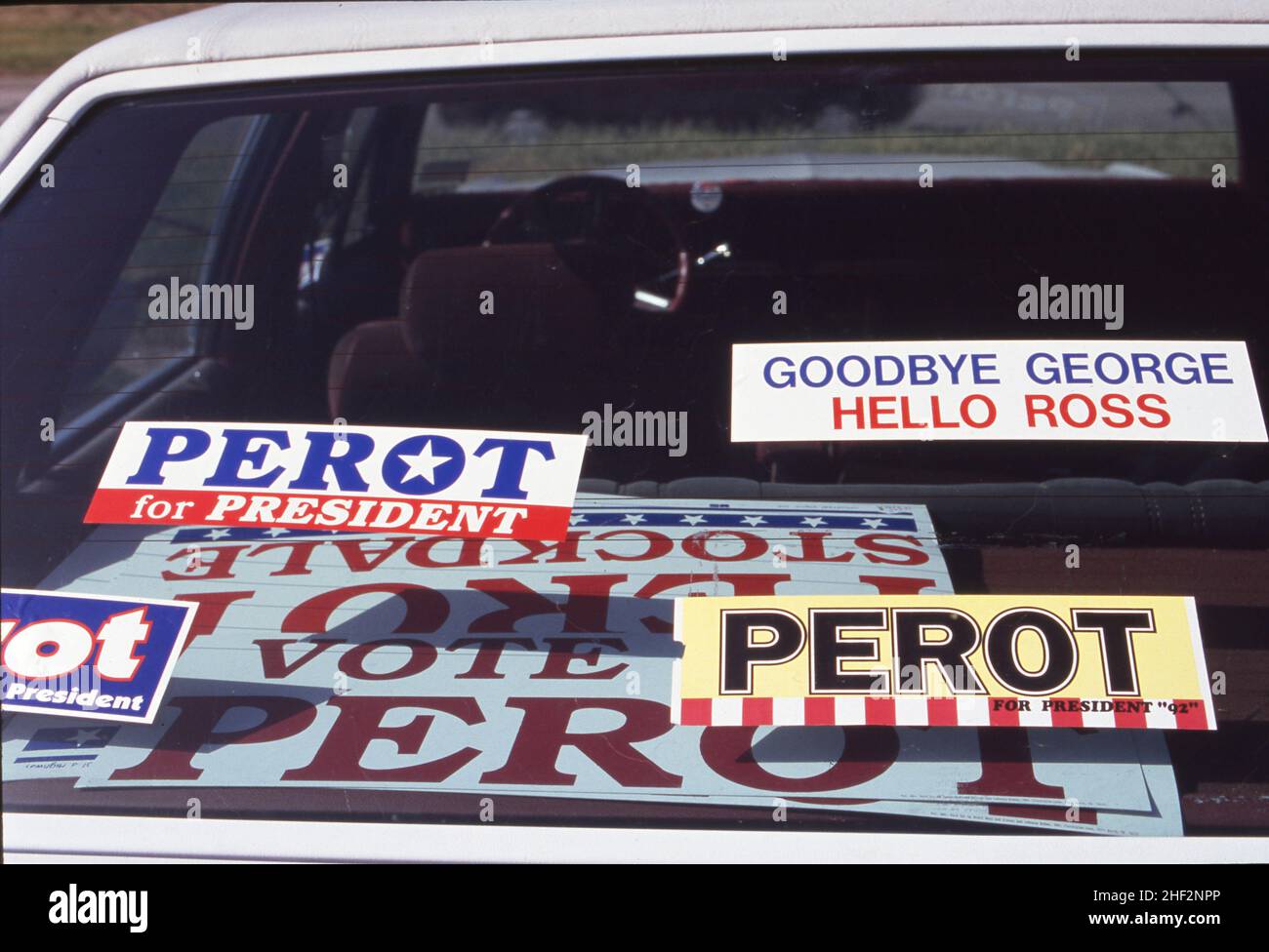 Plano, Texas USA July 4, 1992: Car plastered with campaign stickers drives in Ross Perot for President parade on Independence Day. ©Bob Daemmrich Stock Photo