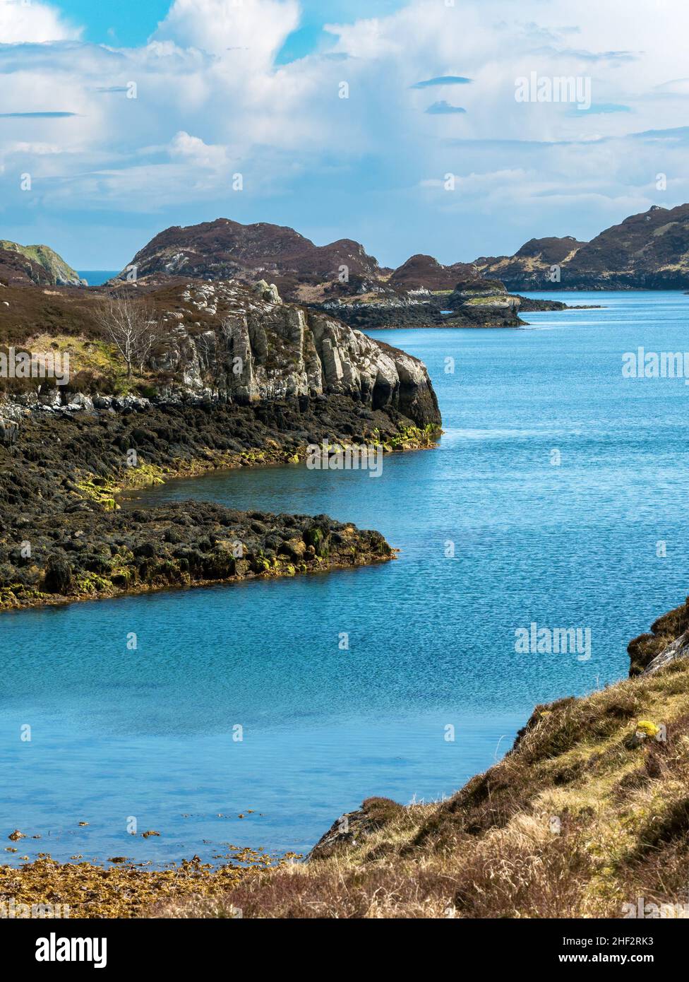 Rocky coastline near Cromor on the East Coast of the Isle of Lewis in the Outer Hebrides, Scotland, UK Stock Photo