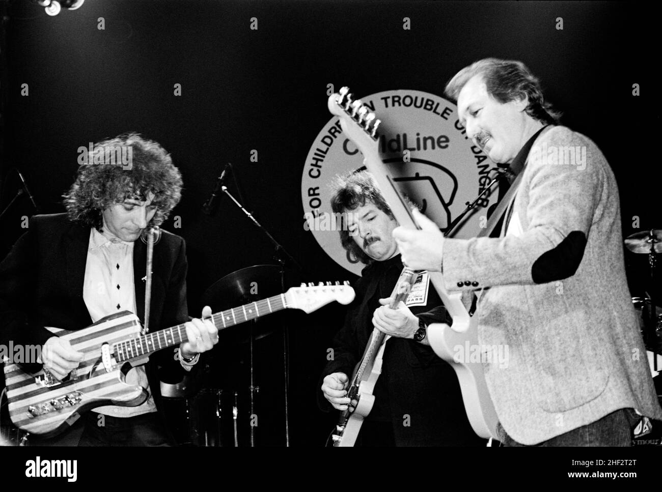 Albert Lee, Seymour Duncan and James Burton performing at a charity jam at the Town & Country Club, London, England in 1987. Stock Photo