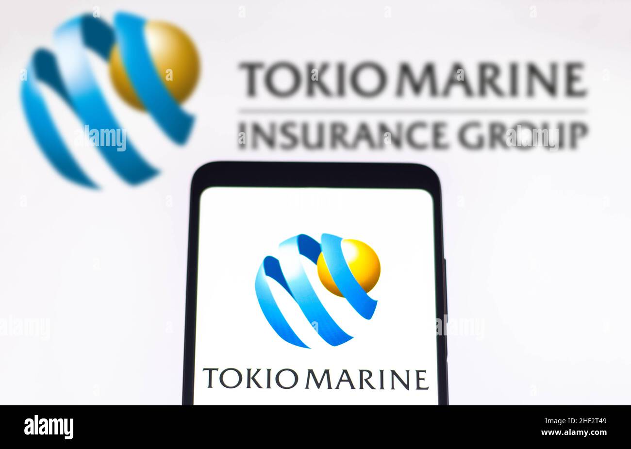 In this photo illustration, a Tokio Marine Holdings logo is seen ...
