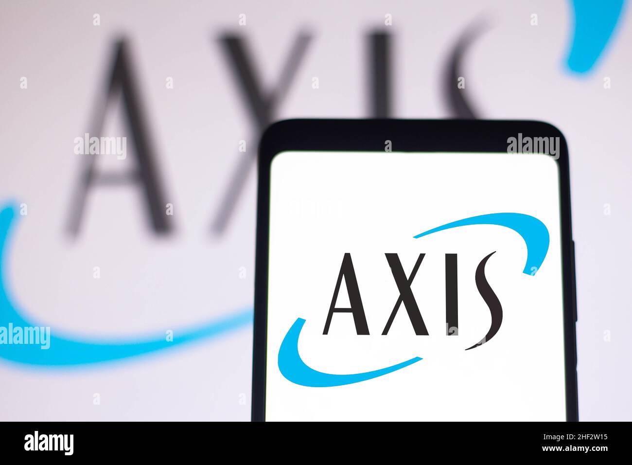 In this photo illustration, an AXIS Capital Holdings Limited logo is