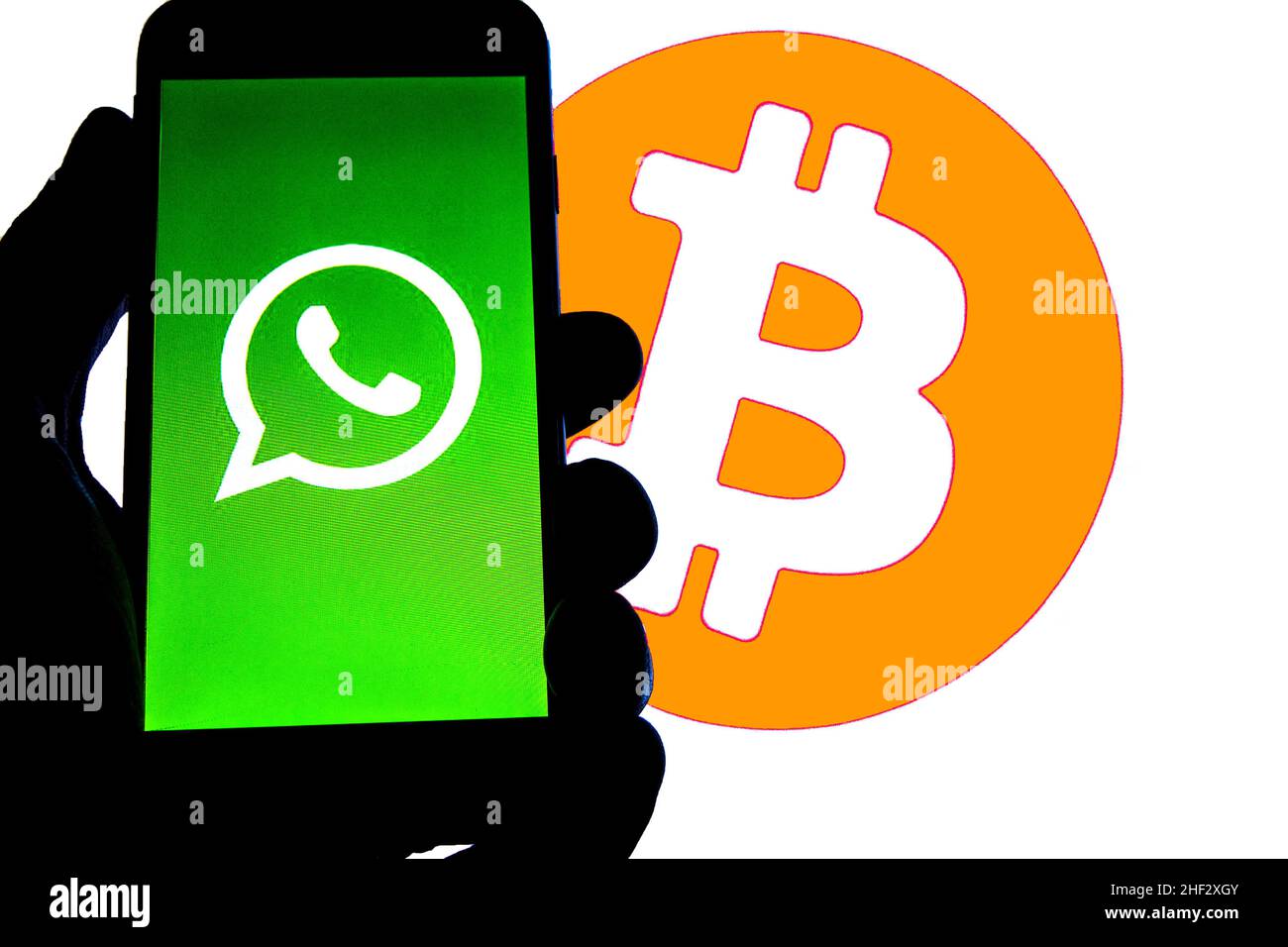 WhatsApp application on smartphone and bitcoin cryptocurency. WhatsApp  launches cryptocurrency payments Stock Photo - Alamy