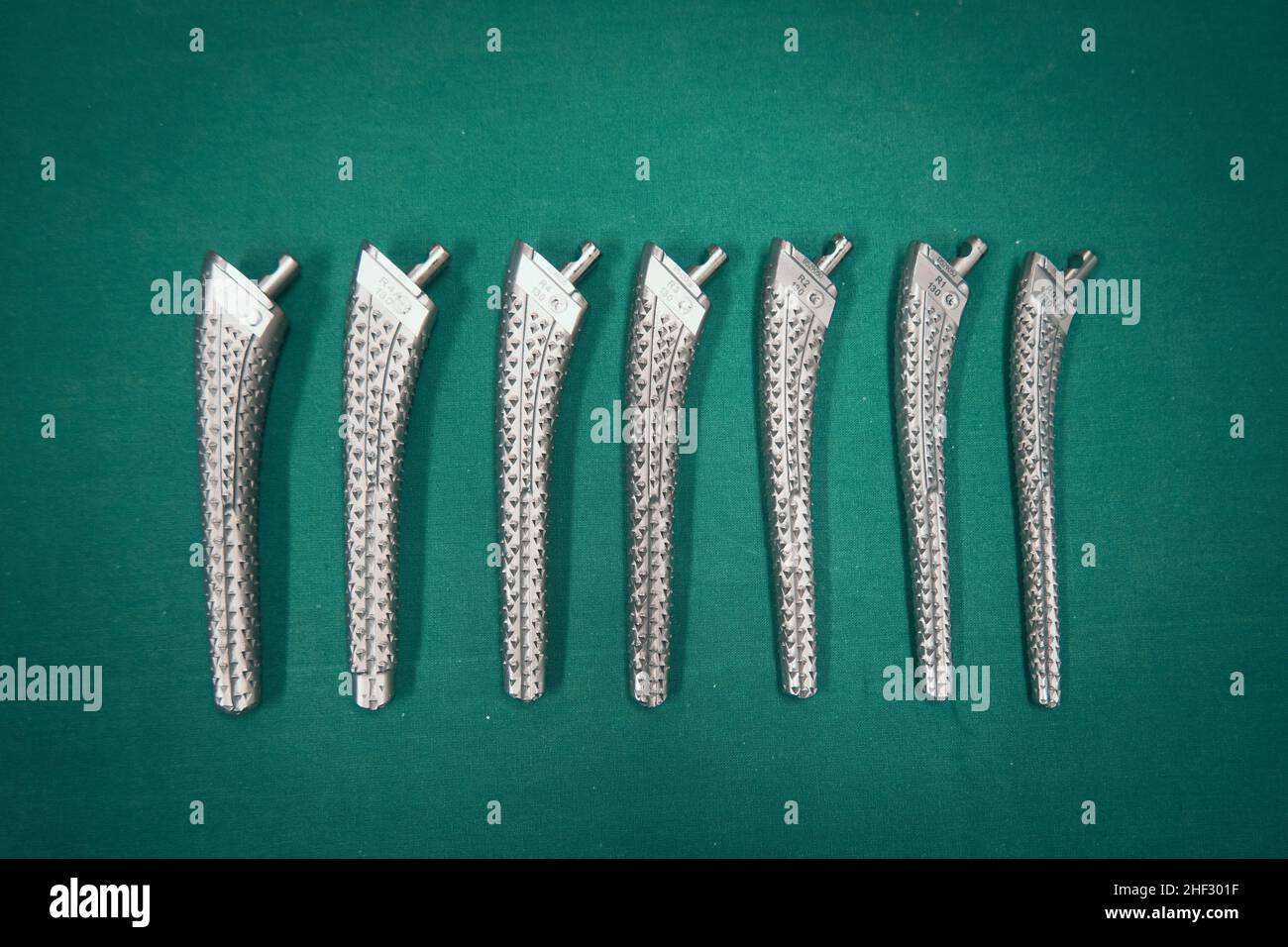 some Surgical rasps of different sizes for a transfemoral prosthesis ...