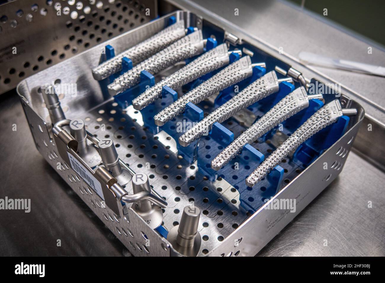 some surgical rasps for a transfemoral prosthesis lie in an instrument ...