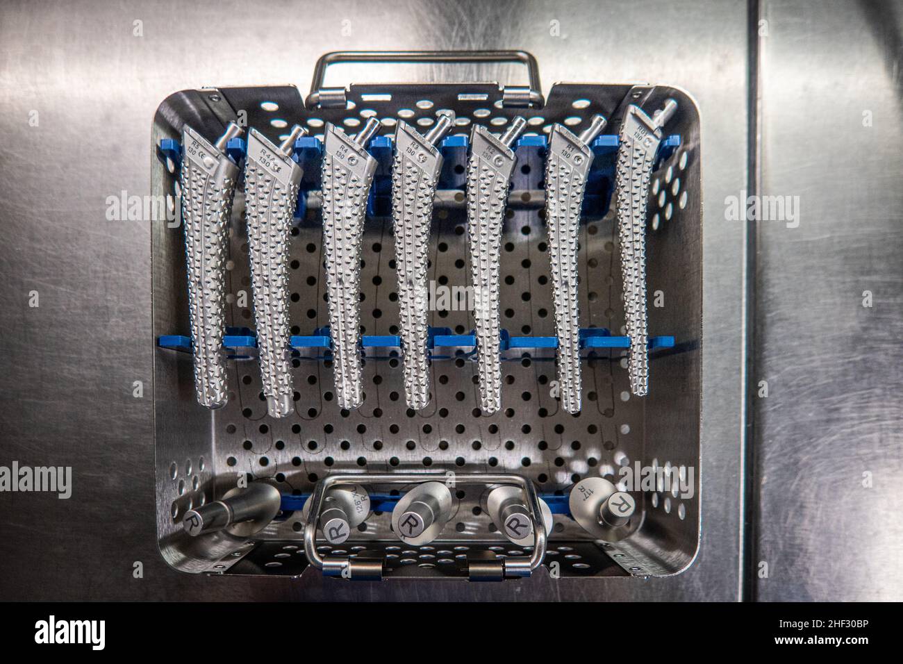 some surgical rasps for a transfemoral prosthesis lie in an instrument ...