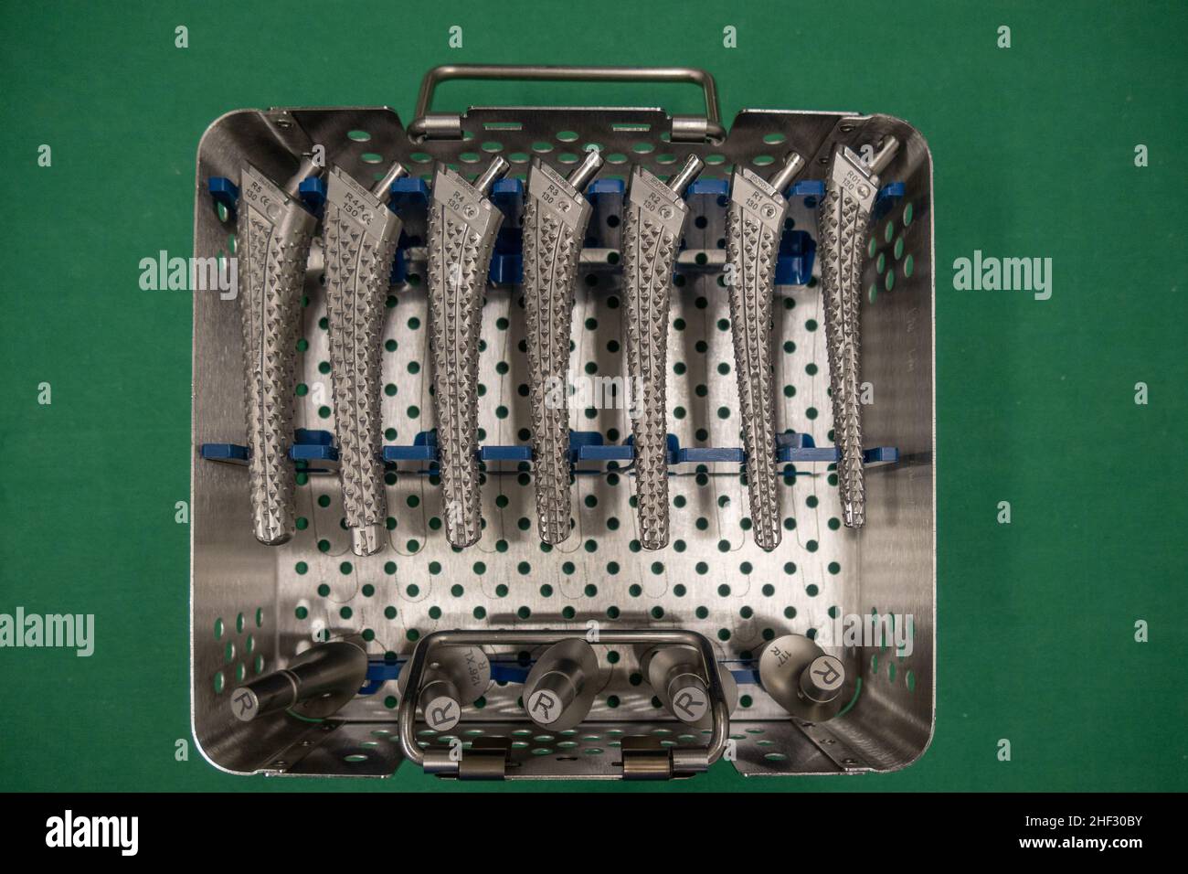 some surgical rasps for a transfemoral prosthesis lie in an instrument ...