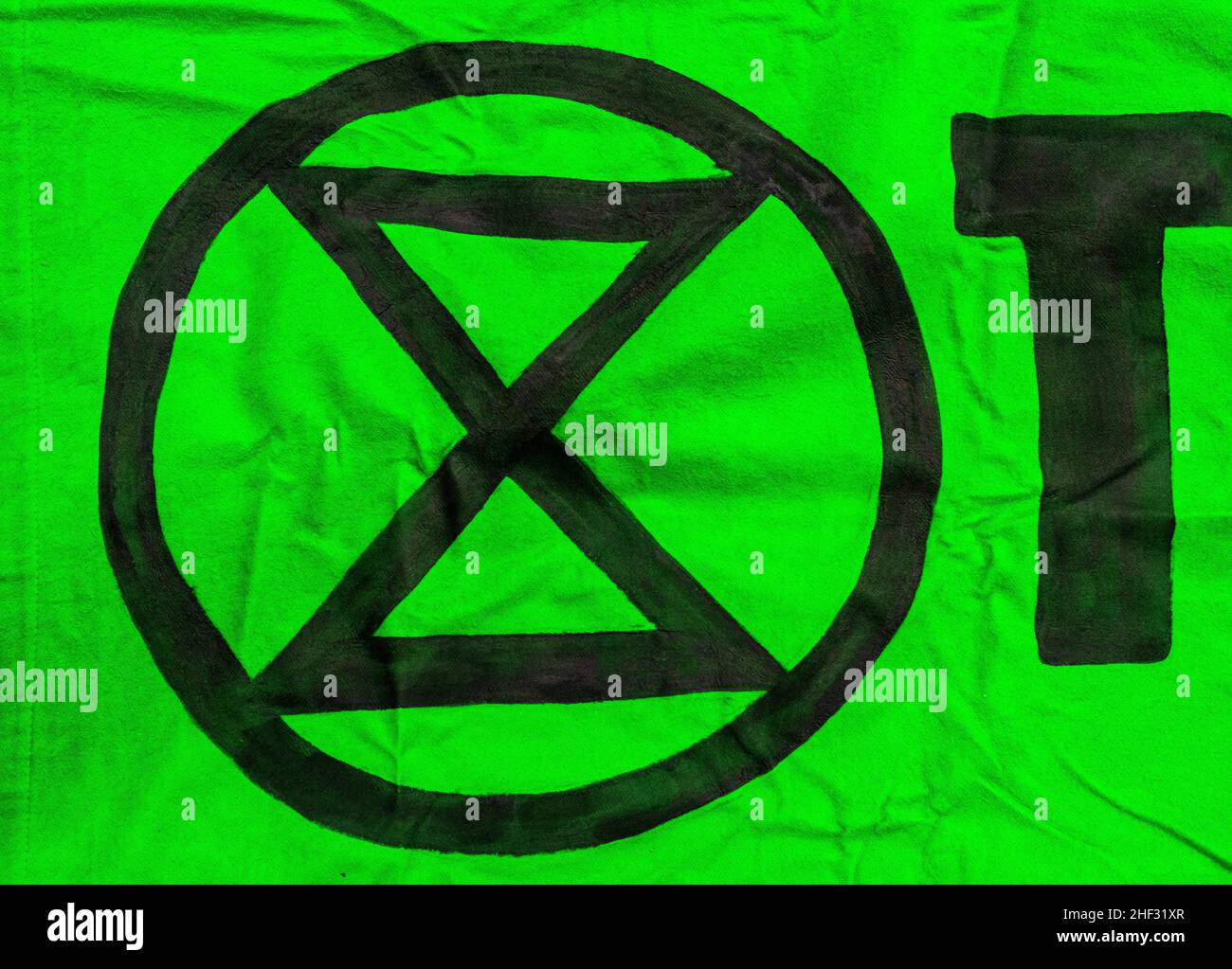 Rotterdam, Netherlands. Extinction Rebellion or XR Logo on a protest march banner, protesting against climate change and the inability of govovernments to do something about it. Stock Photo