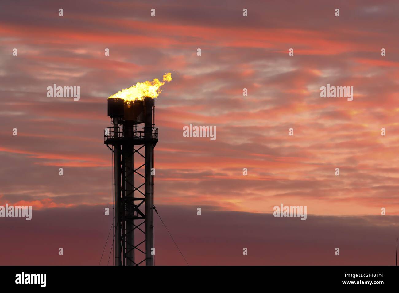 Gas plant flaring at a gas terminal Stock Photo