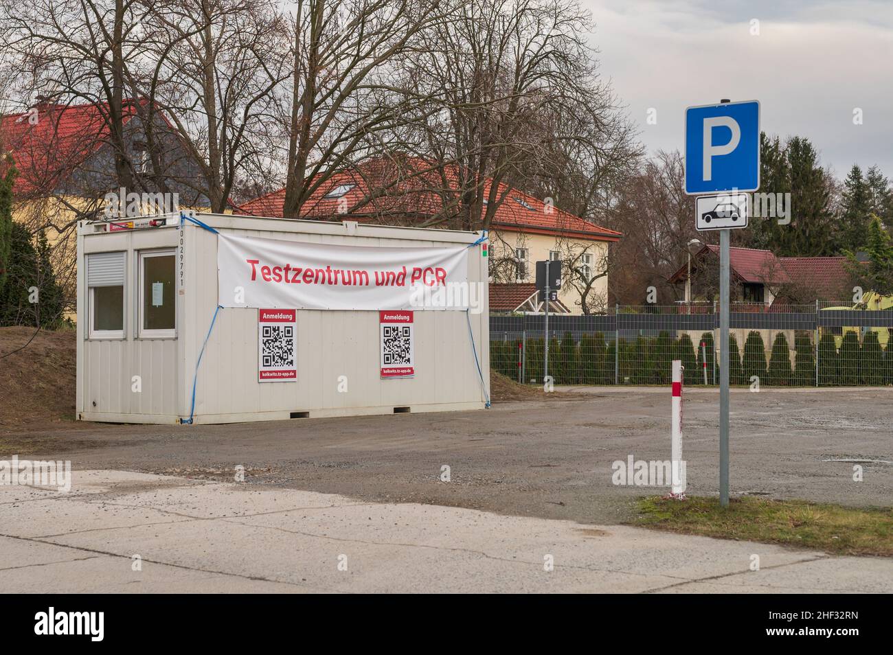 During the Corona pandemic , containers are also used as test centers in villages . Container with banner and the German inscription test center Stock Photo
