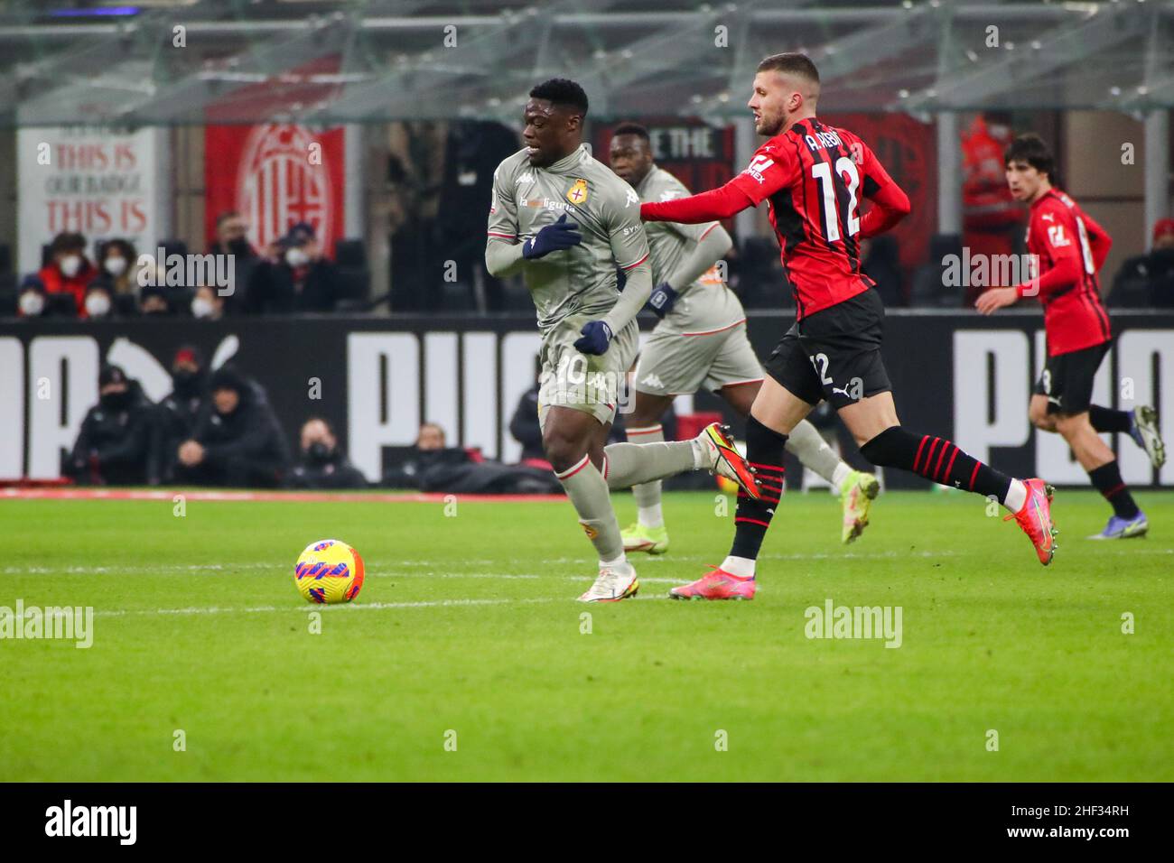 Milan, Italy. 13th Jan, 2022. Ante Rebic of AC Milan and Caleb Ekuban  during the Serie A football match between AC Milan vs Genoa CFC on January  13, 2022 at the Giuseppe