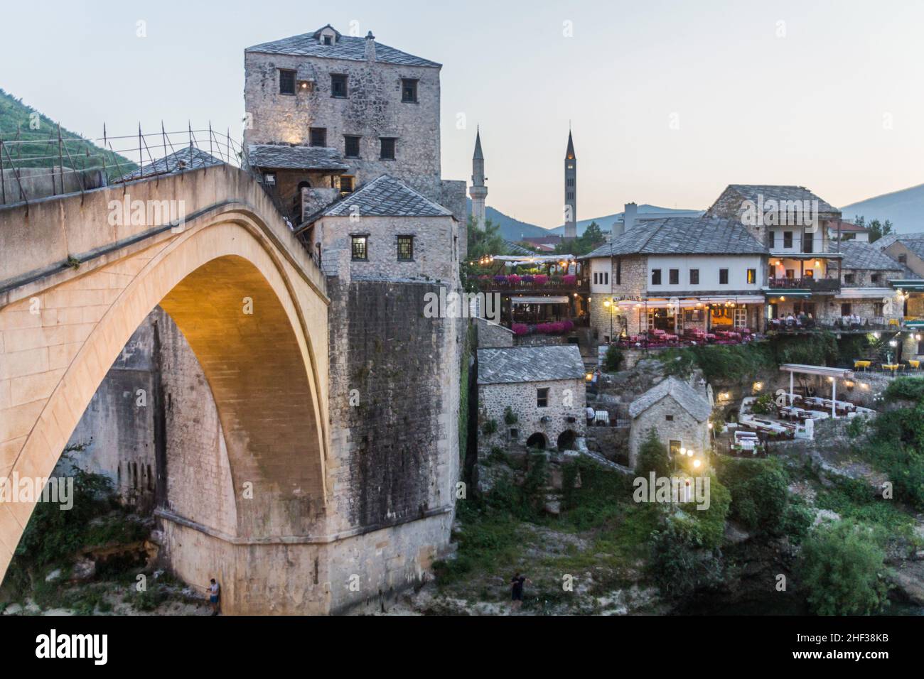Evening view of Stari most (Old Bridge) and old stone buildings in Mostar. Bosnia and Herzegovina Stock Photo