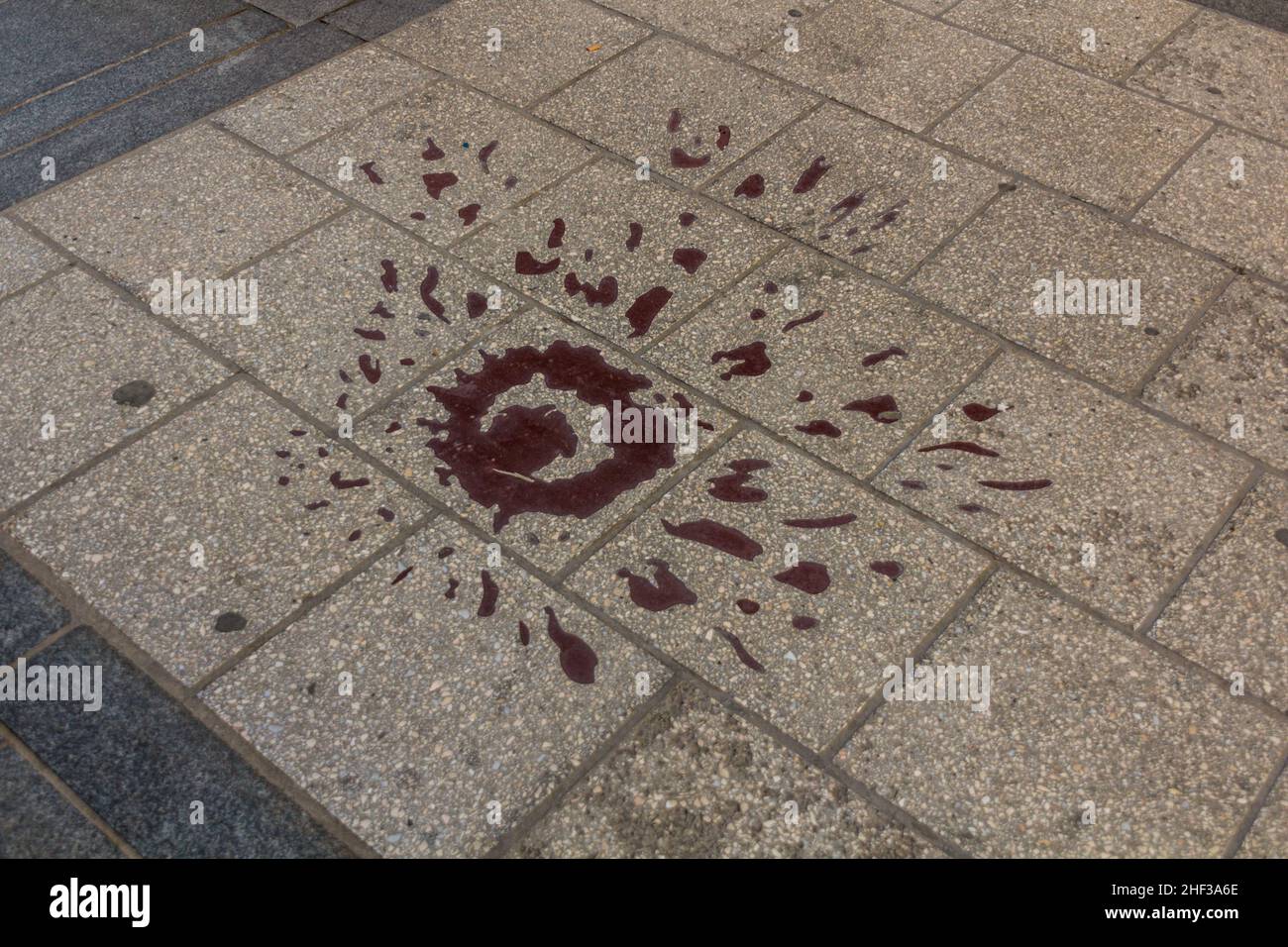 Rose of Sarajevo marking a place of mortar shells explosions during the Siege of Sarajevo in Bosnia and Herzegovina. Stock Photo