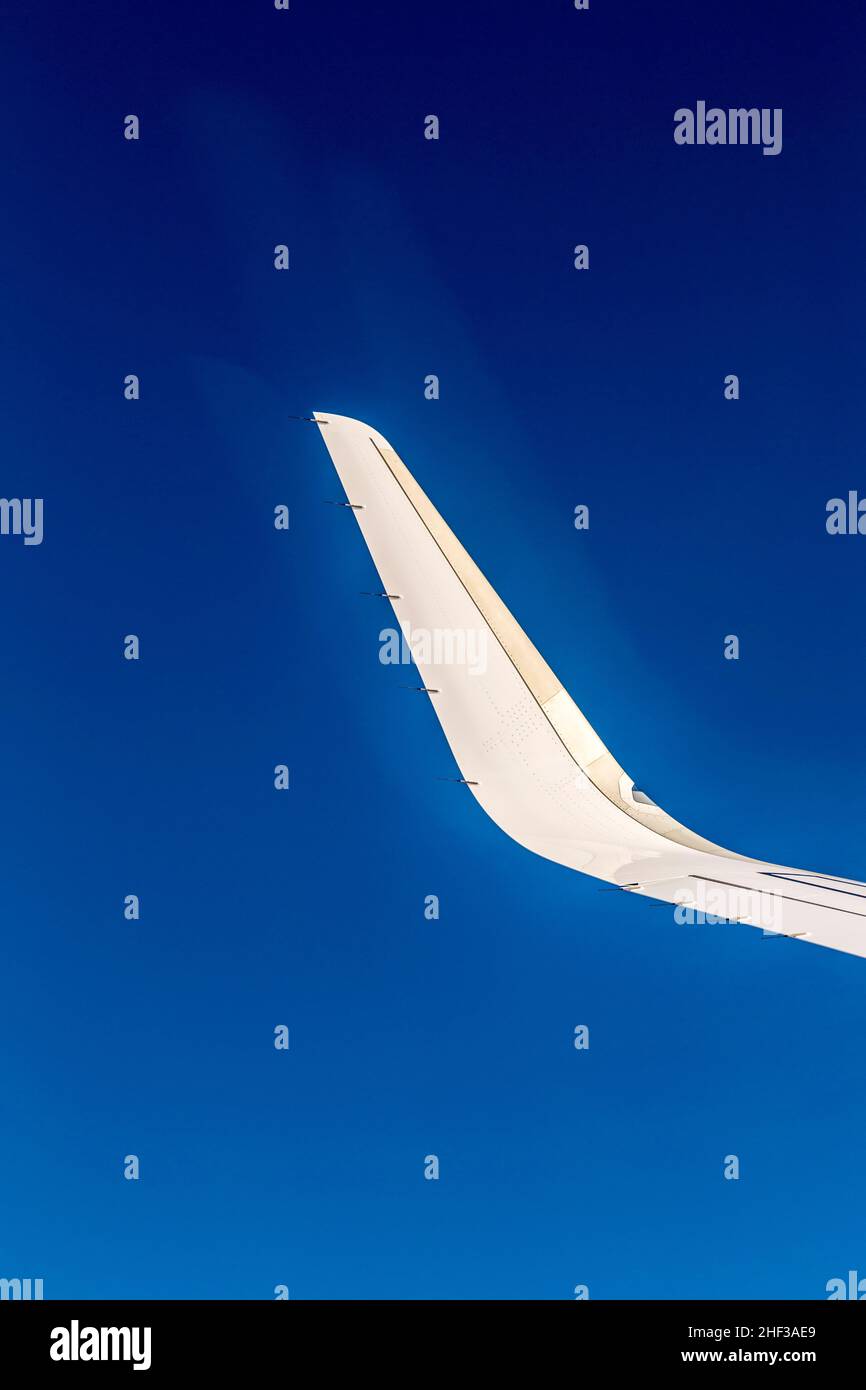 wing and wingtip device under clear blue sky Stock Photo - Alamy