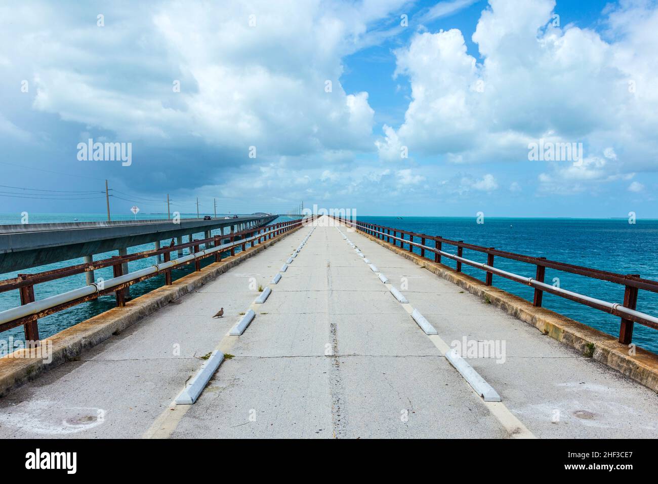 old part of the seven miles bridge under cloudy sky Stock Photo - Alamy