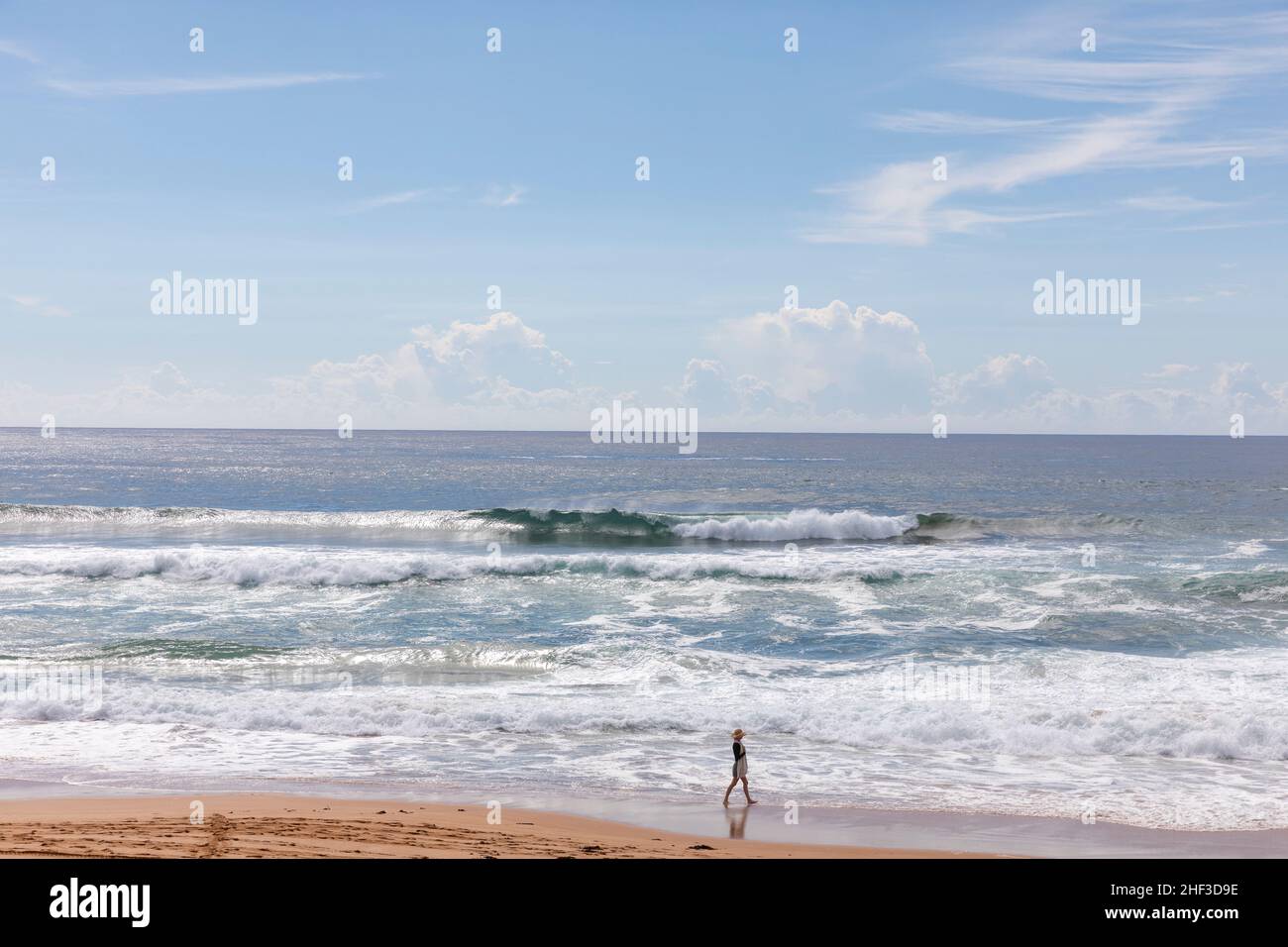Woman walking alone hi-res stock photography and images - Alamy