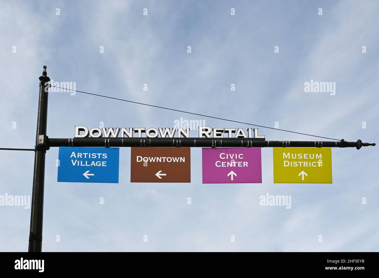 SANTA ANA, CALIFORNIA - 12 JAN 2022: Downtown Retail sign over Santa Ana Boulevard with directions to Artist Village, Downtown, Civic Center and Museu Stock Photo