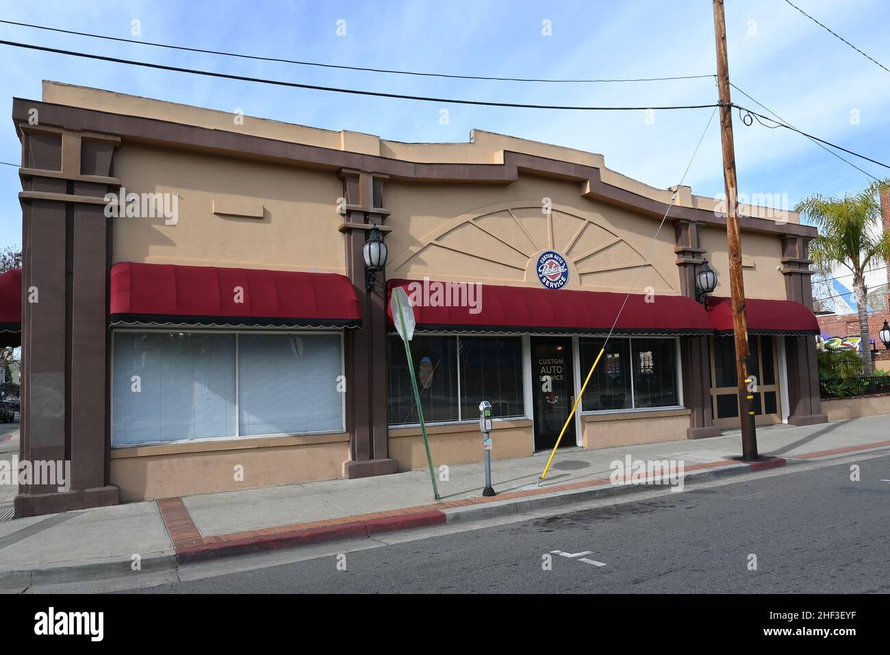 SANTA ANA, CALIFORNIA - 12 JAN 2022: Custom Auto Service, Packard Restoration Specialists, on French Street in downtown Santa Ana. Stock Photo