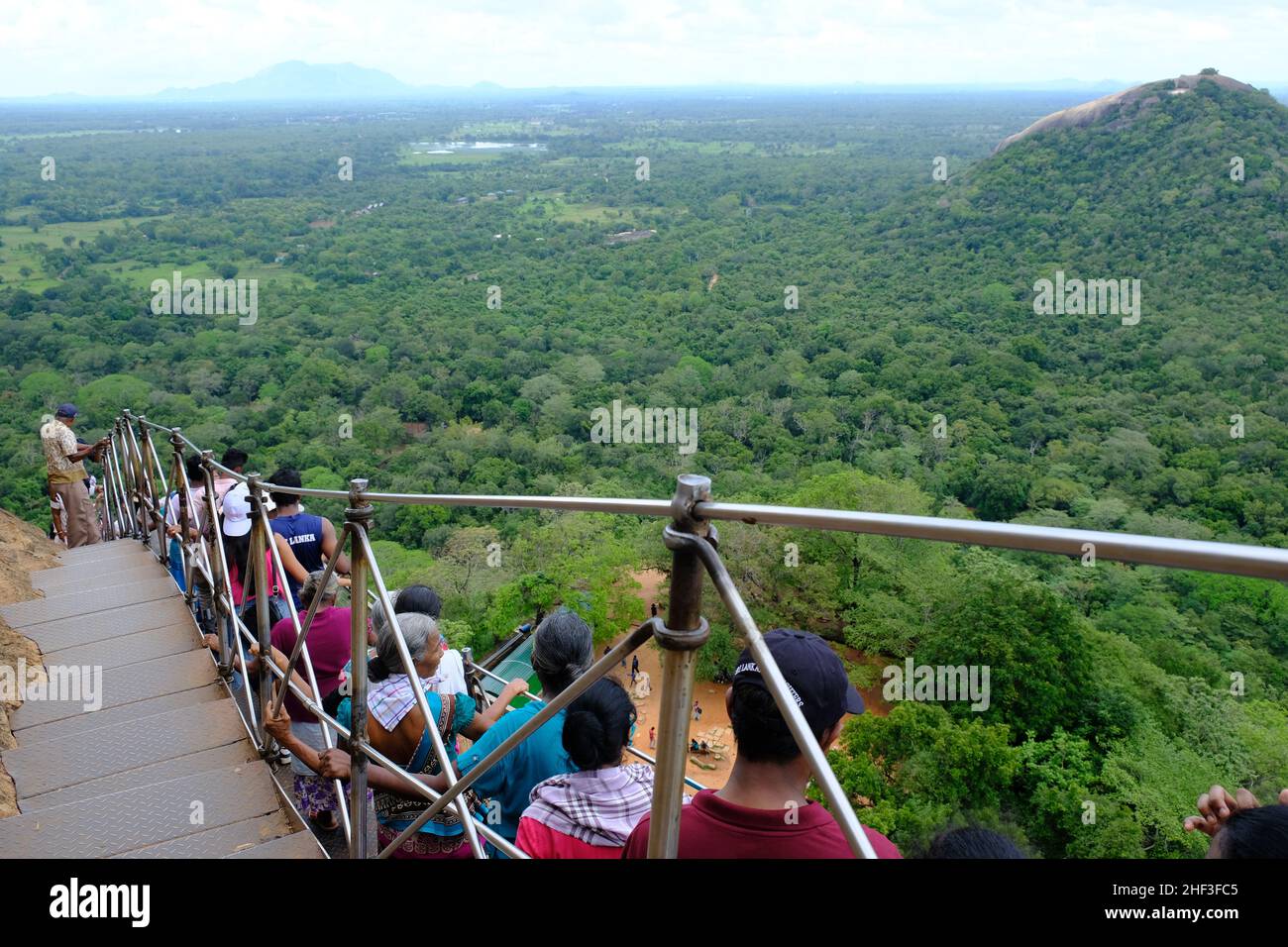 Sri Lanka Sigiriya - Ancient rock fortress People Climbing the Sigiriya Rock Stock Photo