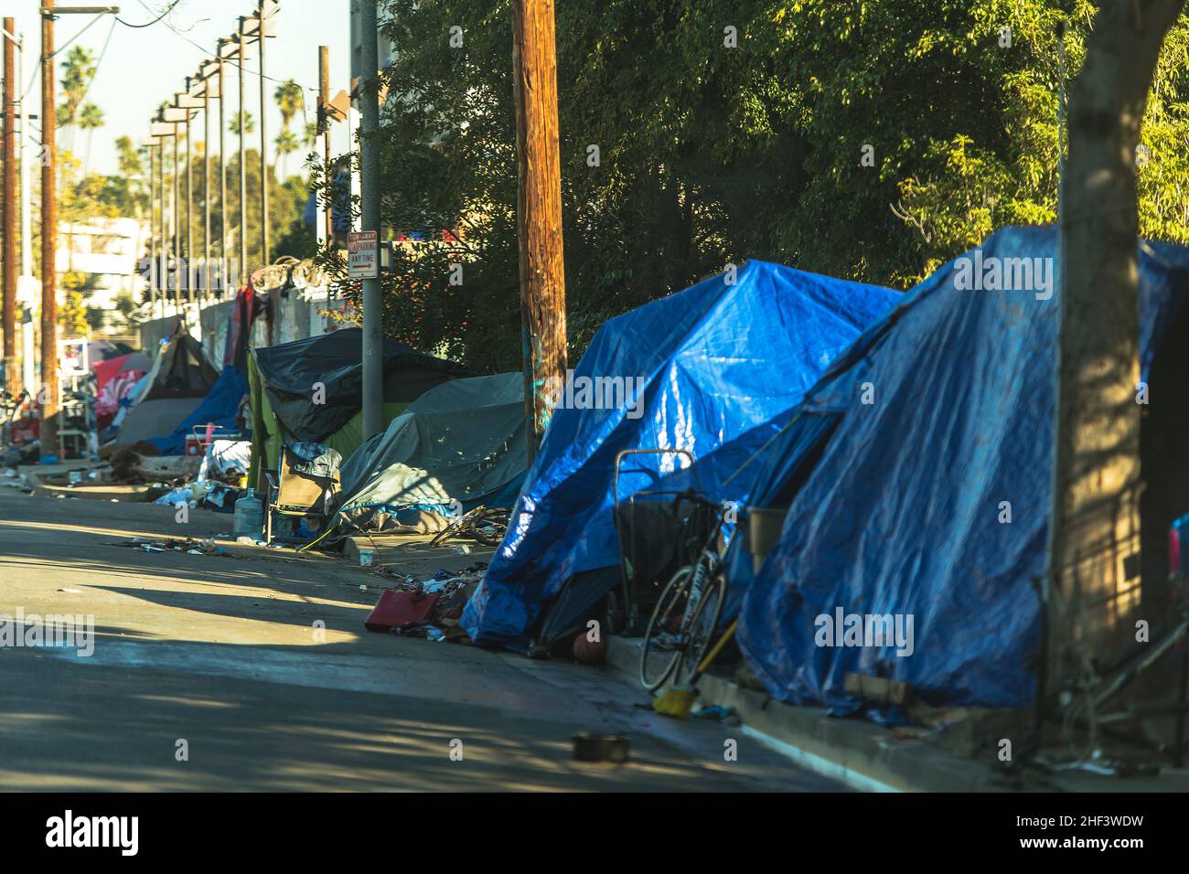 West Hollywood Homelessness Wild Tents Camp. Homeless People in the Middle of the Modern American City. Stock Photo