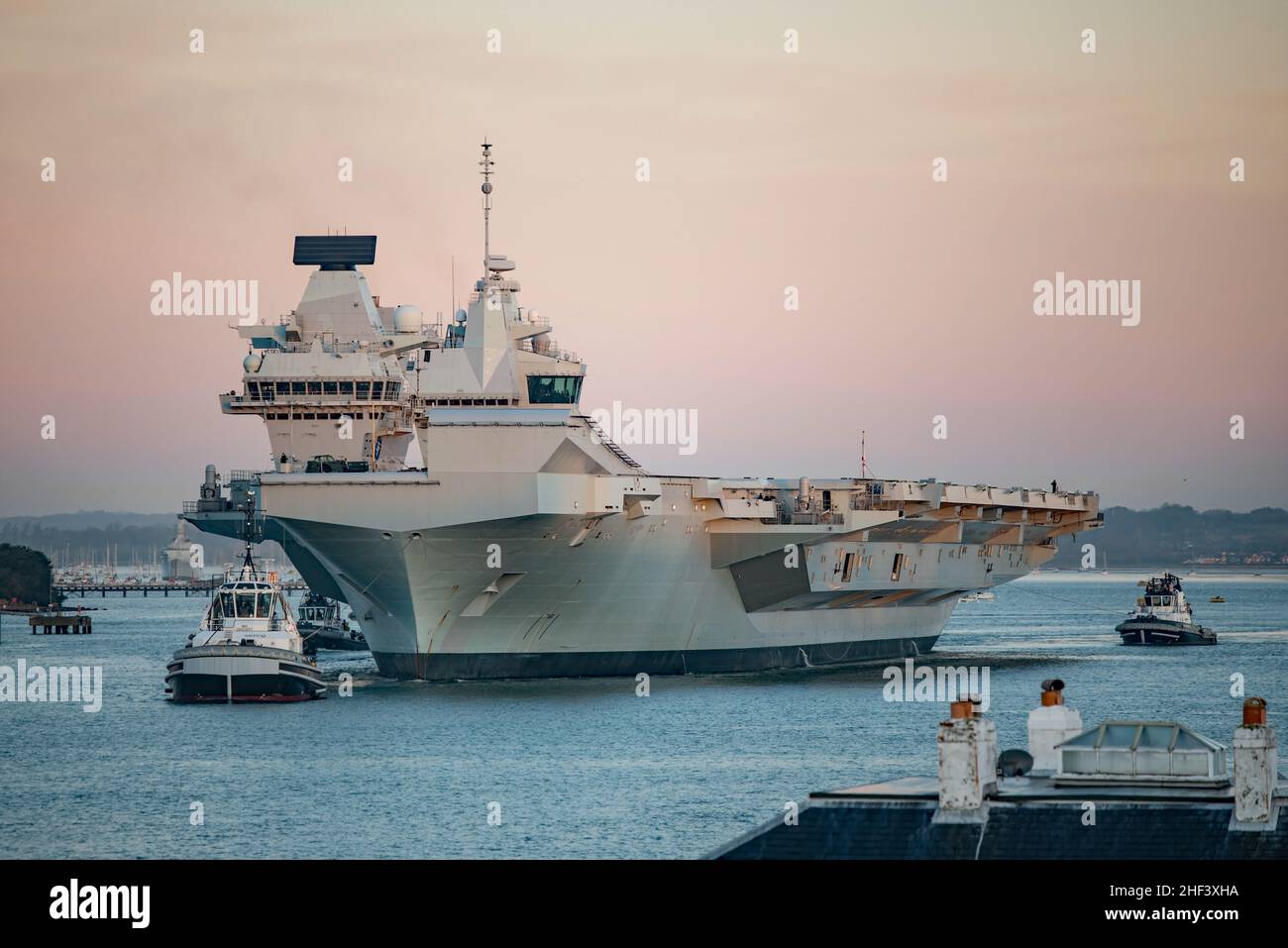Royal Navy warship HMS Prince of Wales (R09) left Portsmouth Harbour, UK at sunrise on 12/1/22 to take over as flagship of the NATO Response Force. Stock Photo