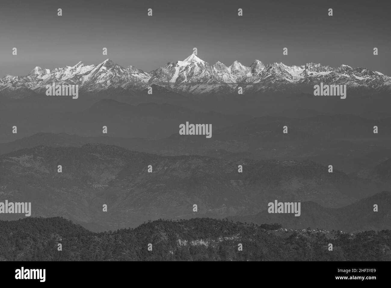 View of high altitude peaks and glacier in the Kumaun Himalayan range in monochrome Stock Photo