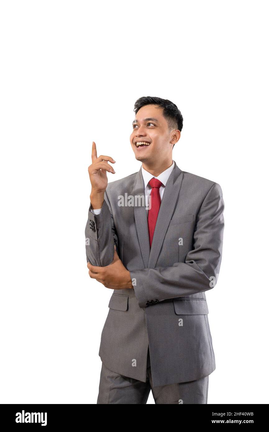 happy young man business showing blank space isolated Stock Photo - Alamy