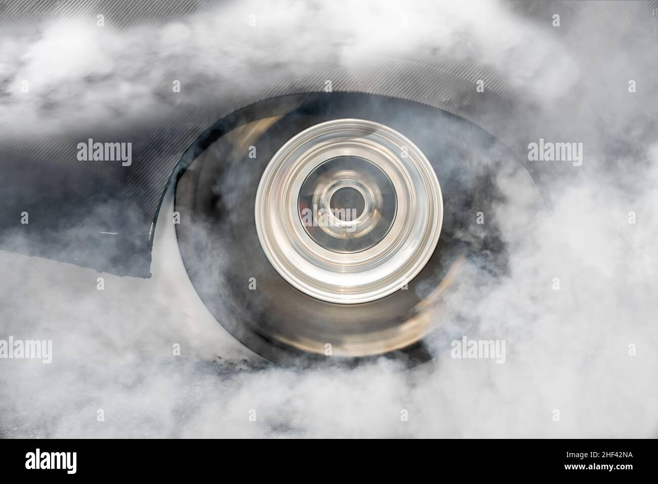 Drag racing car burns tires hi-res stock photography and images - Alamy