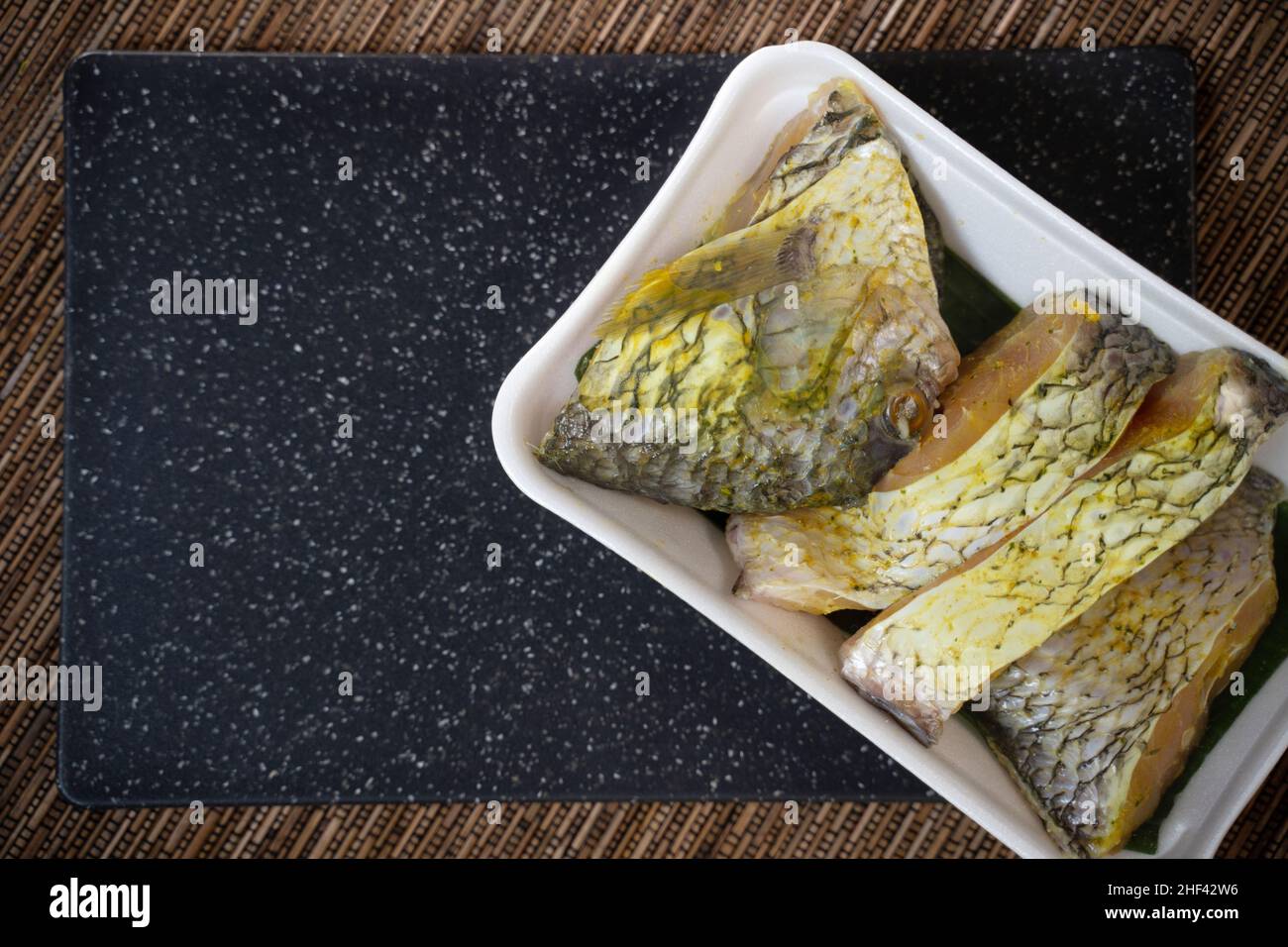 Fish pieces wrapped in a polyethylene polymer packaging Stock Photo Alamy