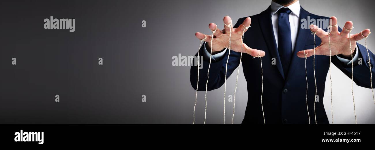 Marionette Puppet Master Hands. Manipulation And Social Control Stock Photo