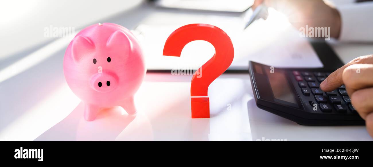 Question Mark Next To Piggy Bank. Money Saving And Investment Strategies Concept Stock Photo Alamy