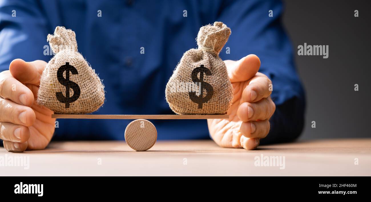 Money Balance On Scales. Judicial Law System Stock Photo