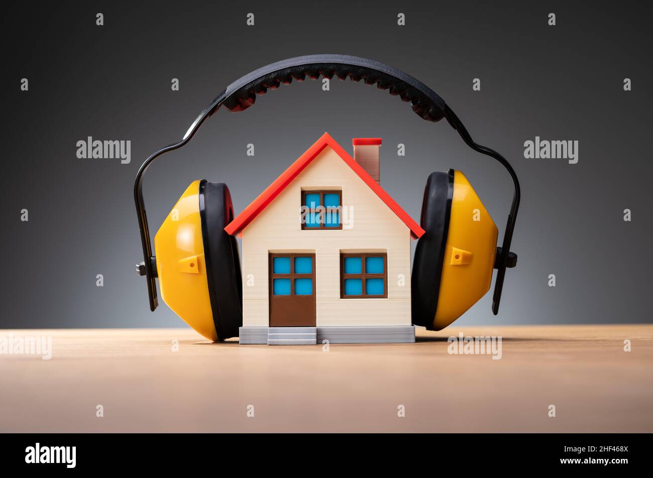 House Loud Noise Protection. Construction Sound Protection Stock Photo