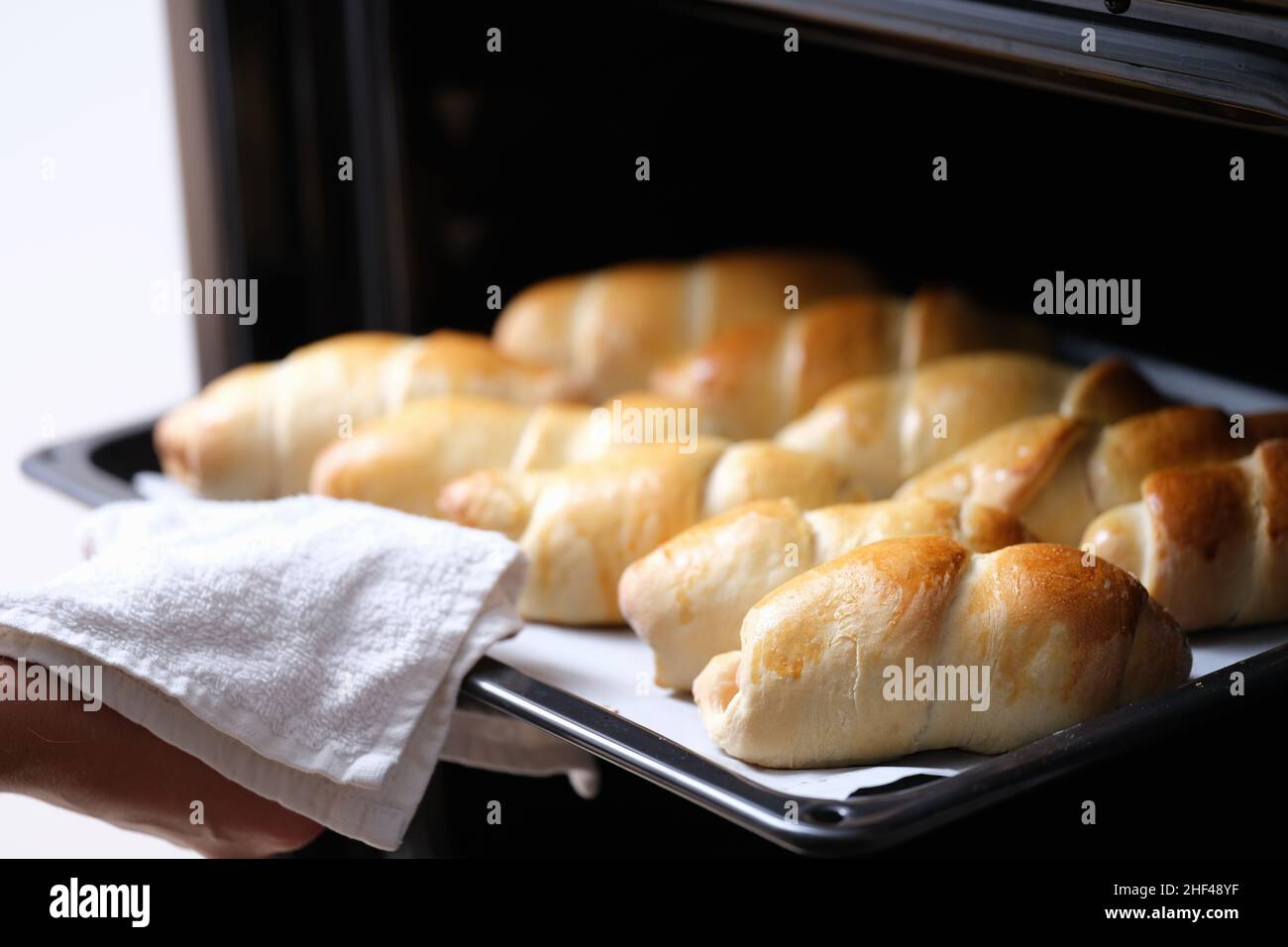 Open oven on a hot baking sheet, fresh baked goods Stock Photo Alamy