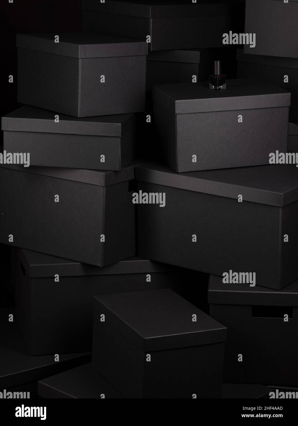 Large dark Stack of Black Boxes in different sizes Stock Photo Alamy