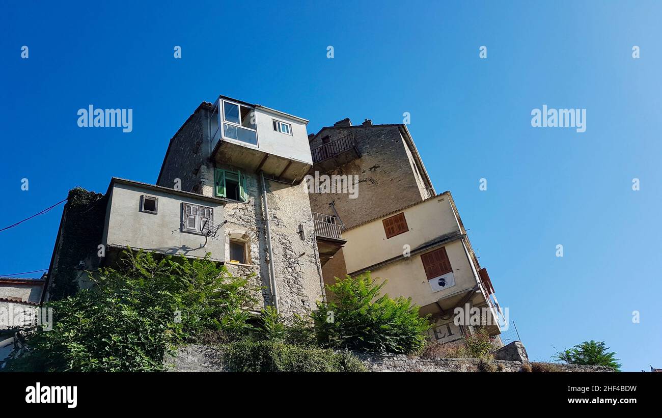 Scenic, nested building in old town of Corte, Corsica, France. Stock Photo