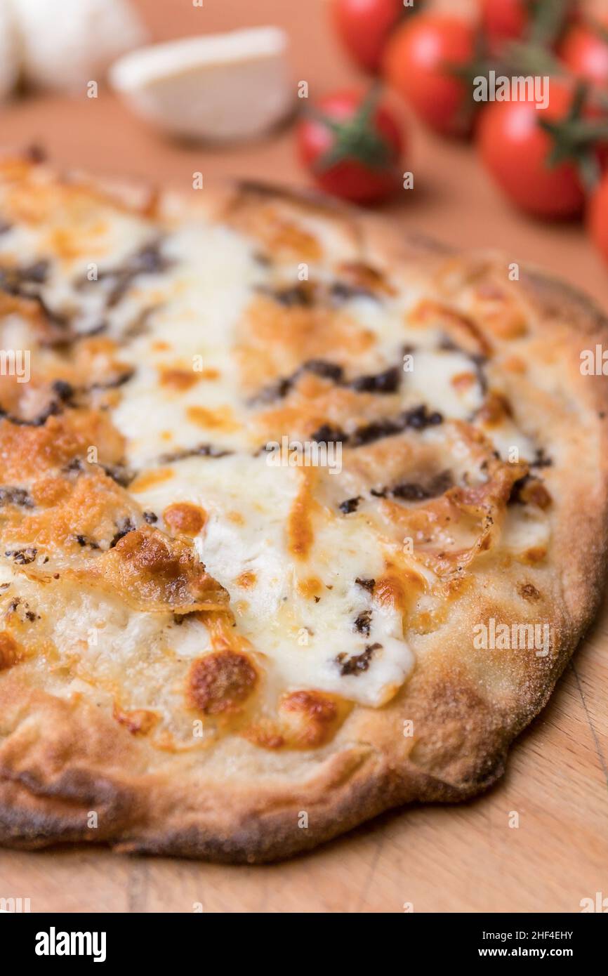 Simple pizza with crunchy crust. Italian pizza. Closeup Stock Photo Alamy