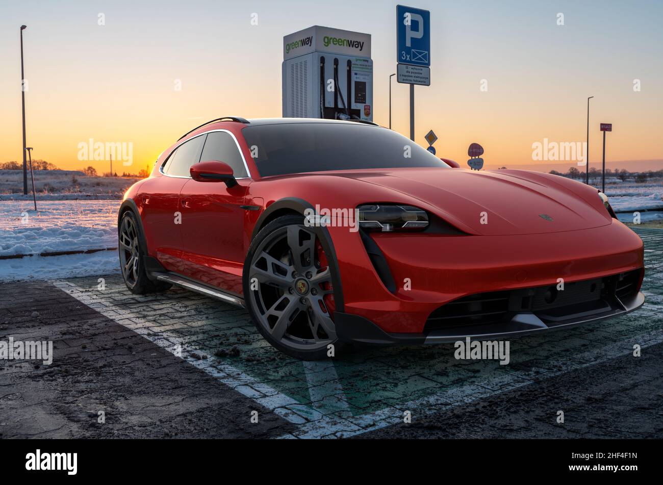 Porsche Taycan Cross Turismo at the Greenway charging station on a cold