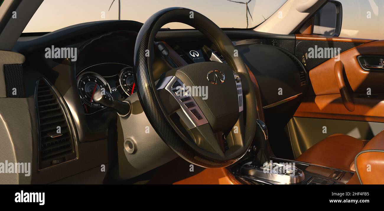 The steering wheel and dashboard of the Infiniti QX80 luxury SUV Stock