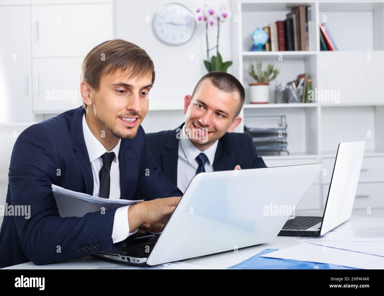 two young managers in office. Stock Photo
