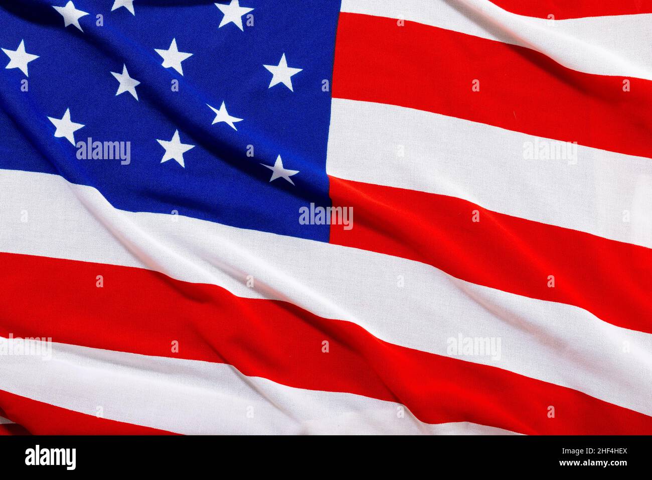 Full frame shot of red and white stripes with stars pattern on america flag Stock Photo
