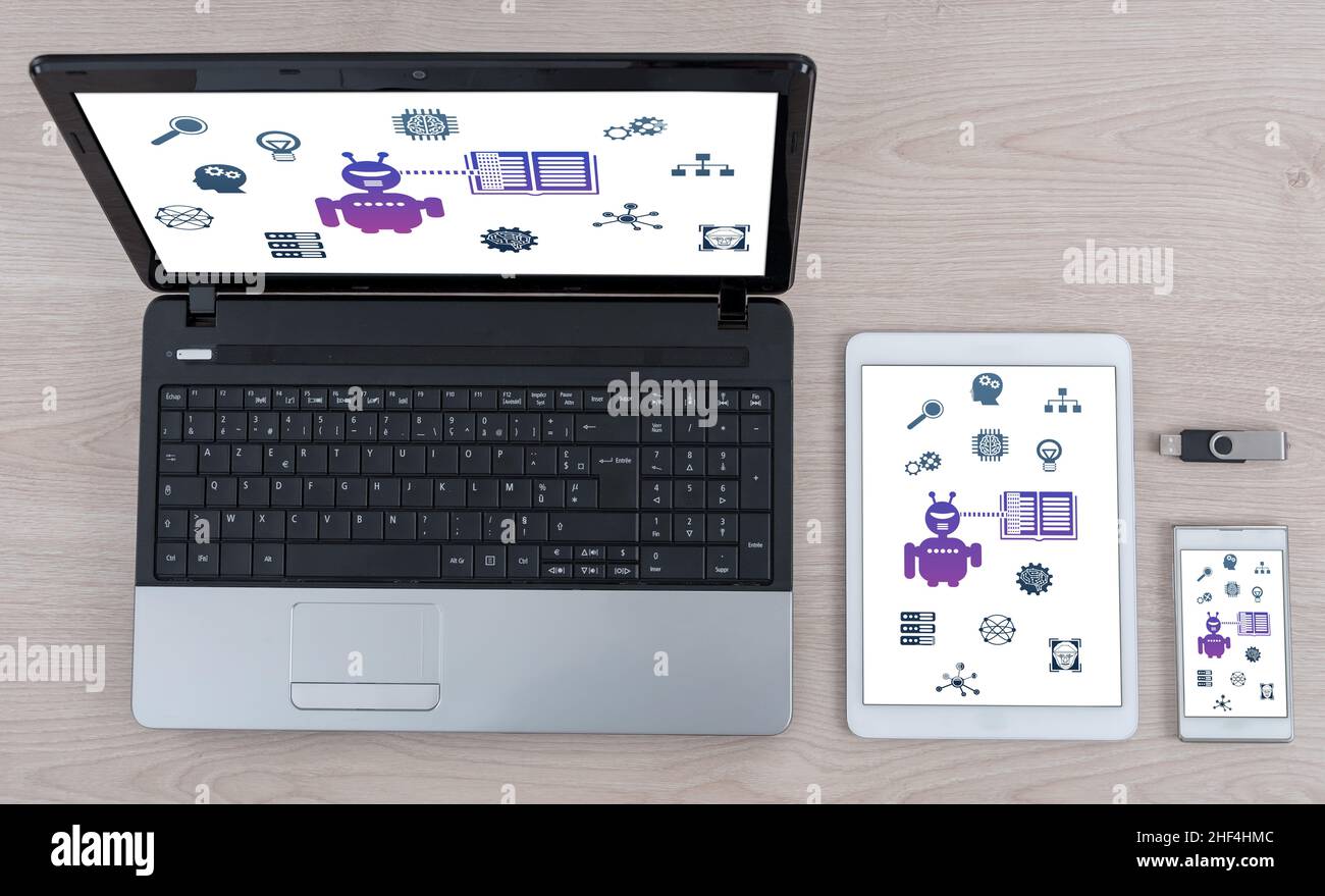 Machine learning concept shown on different information technology devices Stock Photo
